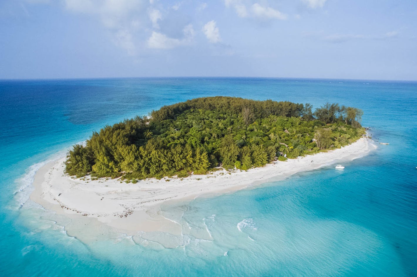 Crystal clear waters near Mnemba Island seen from a quiet Matemwe beach.