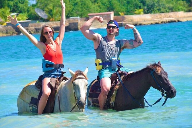 horseback riding on the beach tourist enjoy the experience