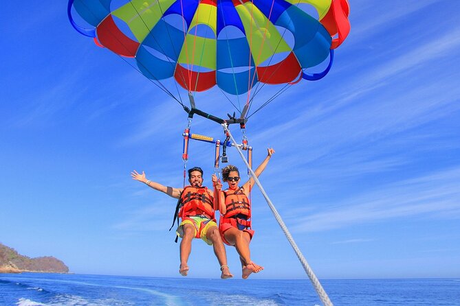 water sports in Zanzibar parasailing to view an island in top of the sky